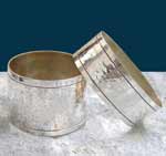 Hammered napkin ring bathed in Silver