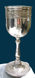 High chiseled cup bathed in Silver